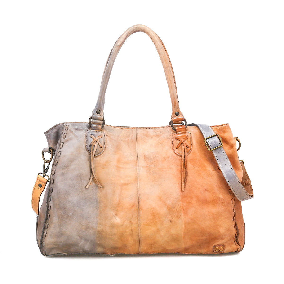 The Rockaway by Bed|Stü is a leather handbag crafted from luxurious full-grain leather in gradient brown tones, featuring dual top handles, a detachable shoulder strap, and decorative edge stitching—combining timeless elegance with everyday functionality.