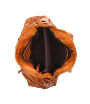 Top view of the Bed|Stü Rockaway bag in open position, showcasing its full-grain brown leather exterior and well-organized interior with a zippered compartment and side pockets—all designed for everyday functionality, set against a white background.