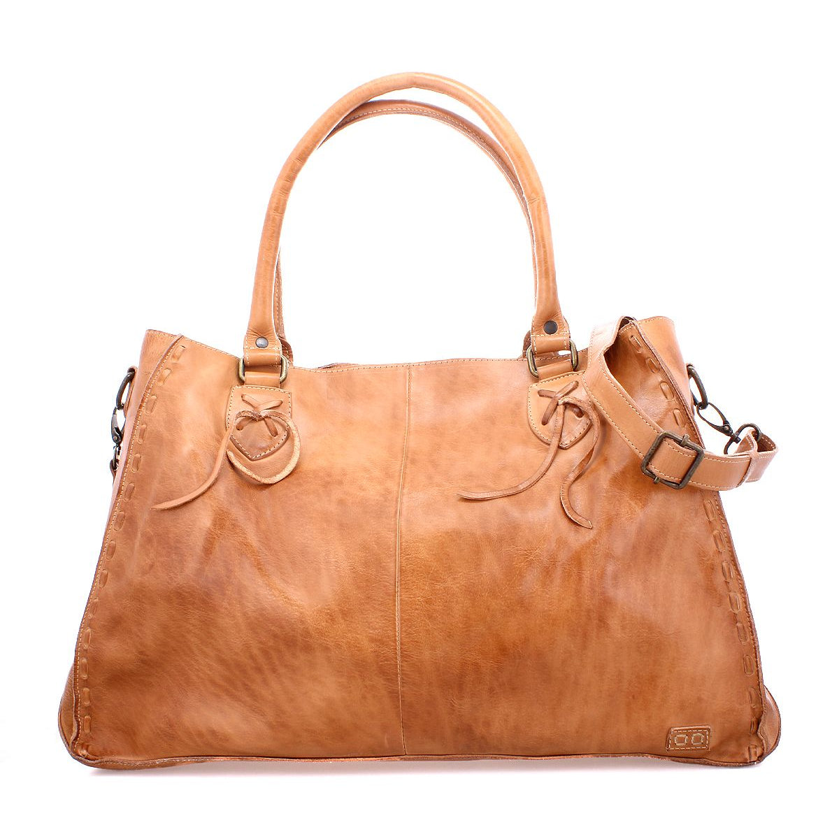 The Rockaway by Bed|Stü is a light brown full-grain leather handbag featuring two handles, a detachable shoulder strap, and minimal edge stitching, showcased against a white background. This classic accessory is thoughtfully designed for everyday function.