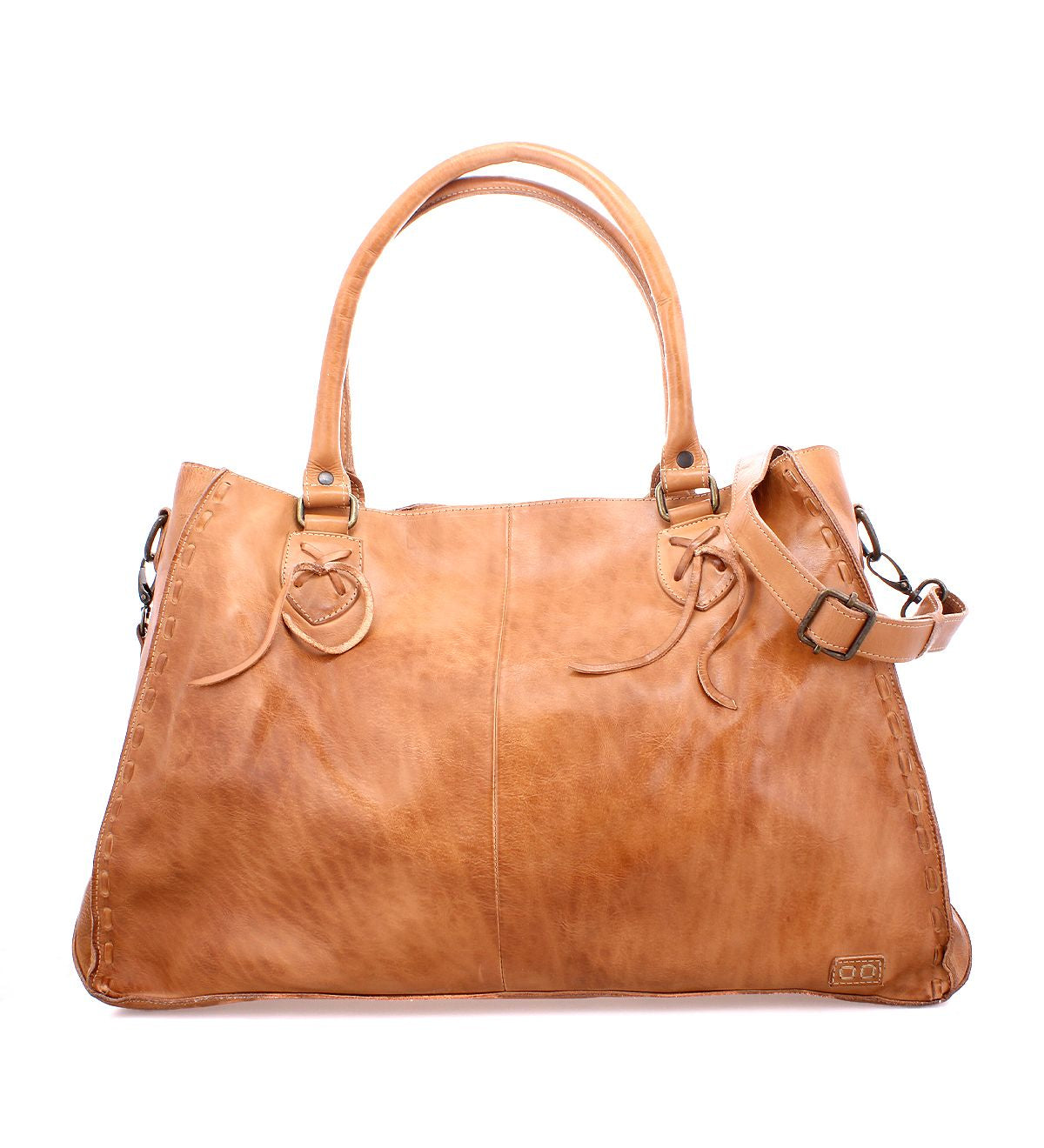 The Rockaway by Bed|Stü is a light brown full-grain leather handbag featuring two handles, a detachable shoulder strap, and minimal edge stitching, showcased against a white background. This classic accessory is thoughtfully designed for everyday function.