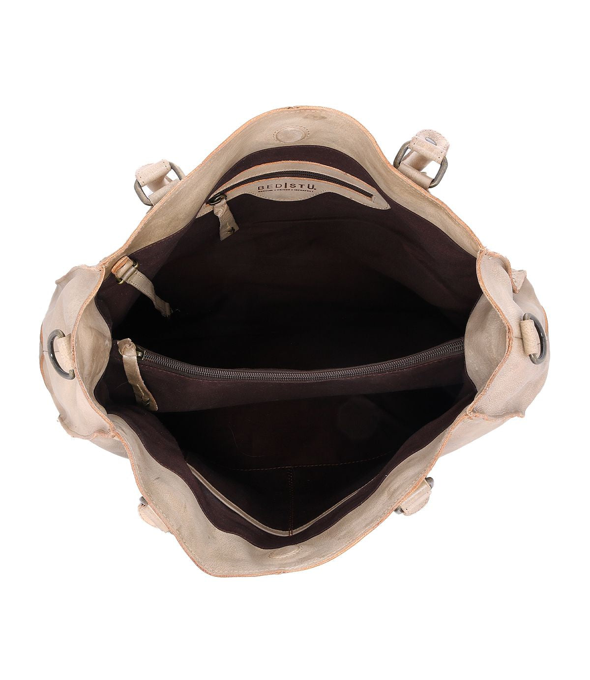 Top view of the open Rockaway handbag by Bed|Stü, crafted from full-grain beige leather and featuring a dark brown interior with a zippered central pocket and side compartments—an elegant blend of style and everyday function.