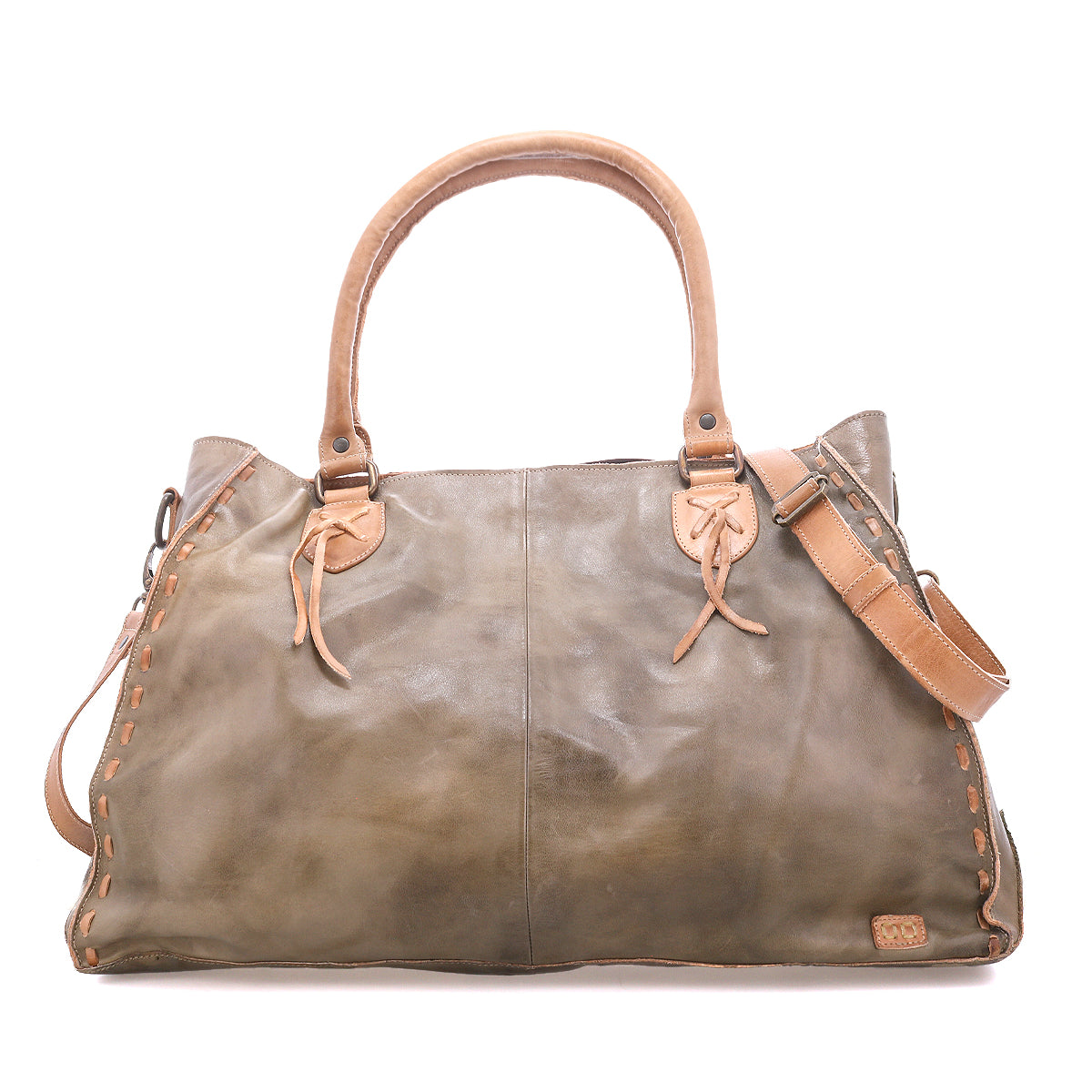 The Rockaway by Bed|Stü is a large brown handbag crafted from premium full-grain leather, featuring dual handles, detailed side stitching, and a detachable shoulder strap. Designed for everyday use, it is showcased against a white background.