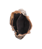 Top view of the Bed|Stü Rockaway, an open brown full-grain leather bag with multiple compartments and pockets, displaying its interior lining and structure against a white background—crafted for everyday function.