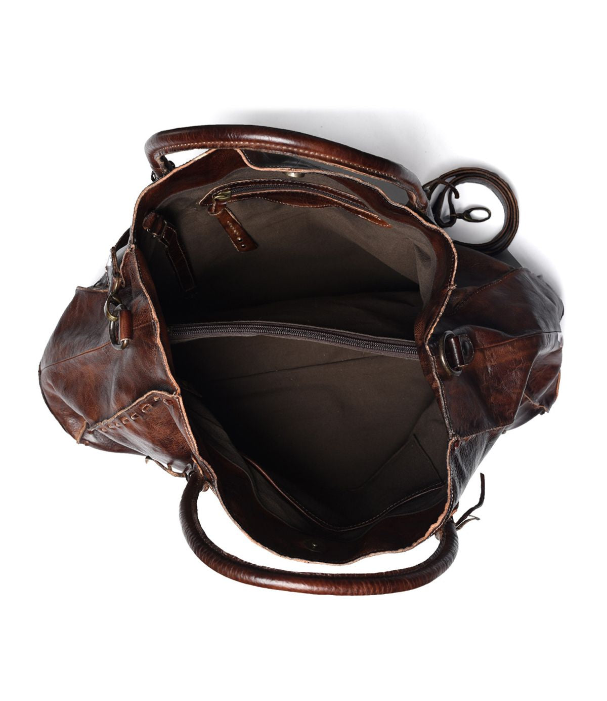 Top-down view of the open Rockaway bag by Bed|Stü, crafted from brown full-grain leather and designed for everyday function, featuring visible compartments—including a zippered pocket, fabric lining, and dual handles.