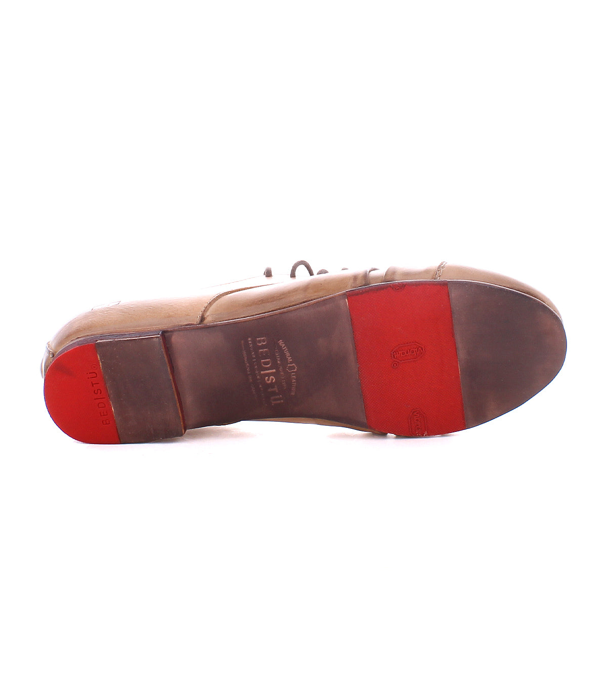Introducing the Rumba II by Bed|Stü—a brown leather lace-up dress shoe, showcased from the sole featuring striking red accents at the heel and toe. Bed|Stü branding and size markings are clearly displayed on the sole, making it an ideal choice for those who appreciate stylish comfort in premium leather footwear.