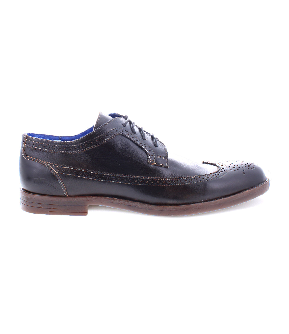 The Sandro II by Bed|Stü is displayed in a side profile view—a single handcrafted leather dress shoe in classic black with a brown sole, elegant wingtip broguing, and blue interior lining.
