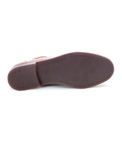 The image shows the brown rubber sole of a handcrafted leather dress shoe, viewed from the bottom. The brand name “Bed|Stü” is embossed near the heel of the Sandro II, reflecting the old-world construction and attention to detail characteristic of classic footwear.