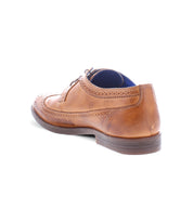 The Sandro II by Bed|Stü is a brown leather dress shoe featuring classic wingtip broguing and brogue detailing, shown from the back against a white background.
