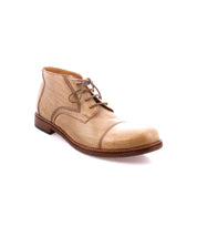 The Scoot boot by Bed|Stü is a tan leather lace-up style, handcrafted in Italy with a rounded toe and brown sole, displayed at a slight angle on a white background.