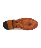 Sole of the Scoot brown quality leather lace-up boot by Bed|Stü, handcrafted in Italy. Red stitching and size 43 are visible.