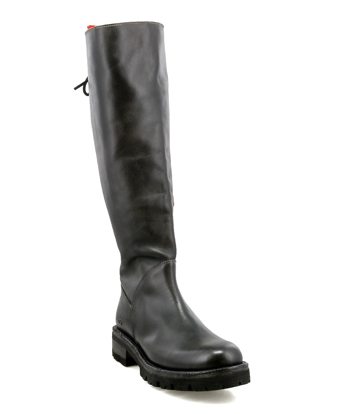 The Bed|Stü Scope is a tall boot crafted from vegetable-tanned leather, featuring a rounded toe, low heel, rugged sole, and a distinctive lace-up back detail. Photographed on a plain white background.