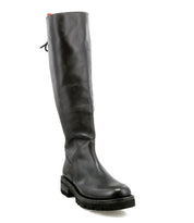The Bed|Stü Scope is a tall boot crafted from vegetable-tanned leather, featuring a rounded toe, low heel, rugged sole, and a distinctive lace-up back detail. Photographed on a plain white background.