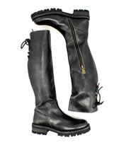The Bed|Stü Scope boots are tall leather boots crafted from premium vegetable-tanned leather, featuring side zippers, rugged soles, and a distinctive lace-up back design, displayed on a white background.