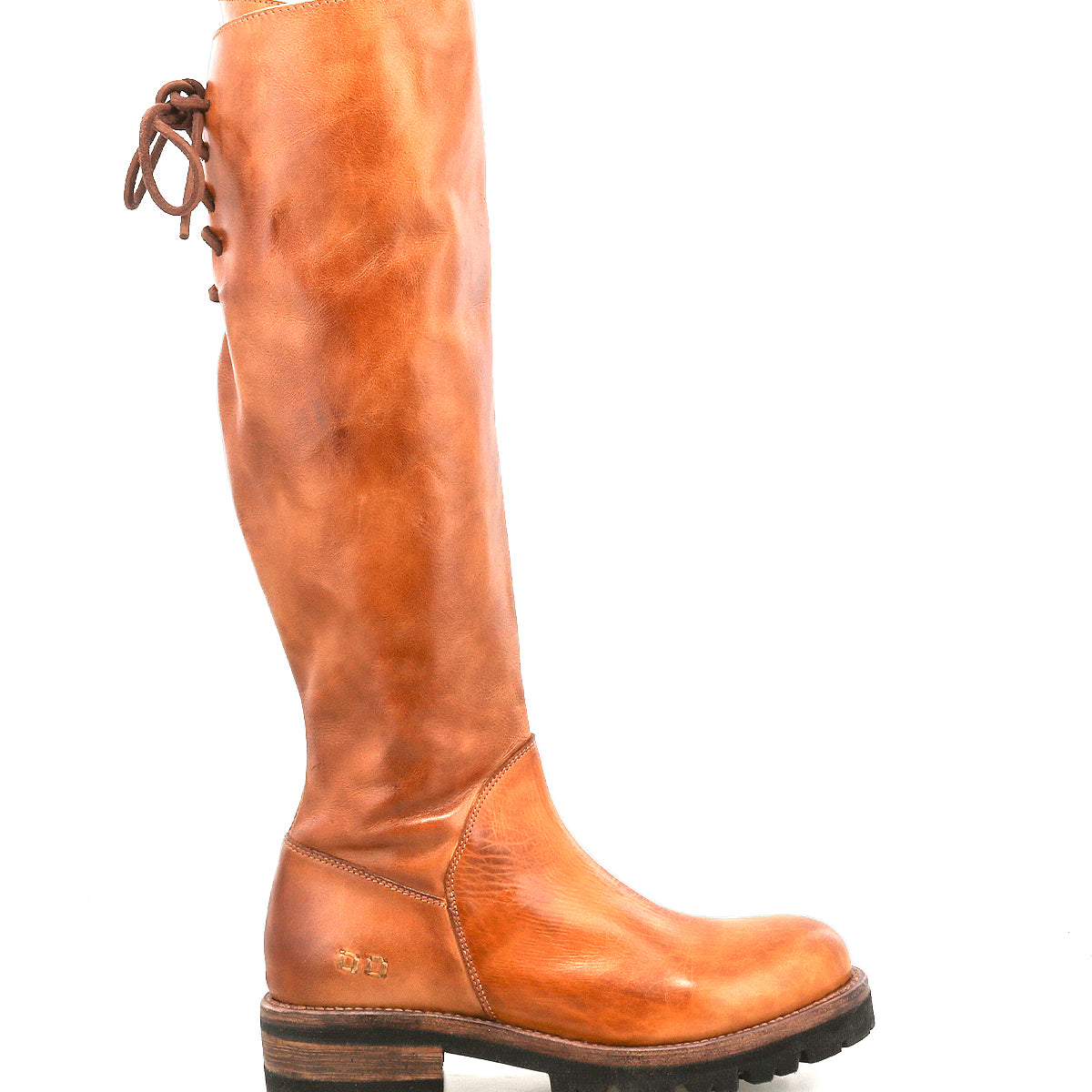 The "Scope" boot by Bed|Stü is showcased against a plain white background, highlighting its tall silhouette made from rich vegetable-tanned leather, with a round toe, lace-up detailing at the back, and a rugged dark rubber sole.