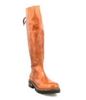 Introducing Scope by Bed|Stü: a tall boot crafted from luxurious, rich brown vegetable-tanned leather with a low heel and durable lug sole. This style features a round toe and an elegant lace-up detail at the back of the shaft.