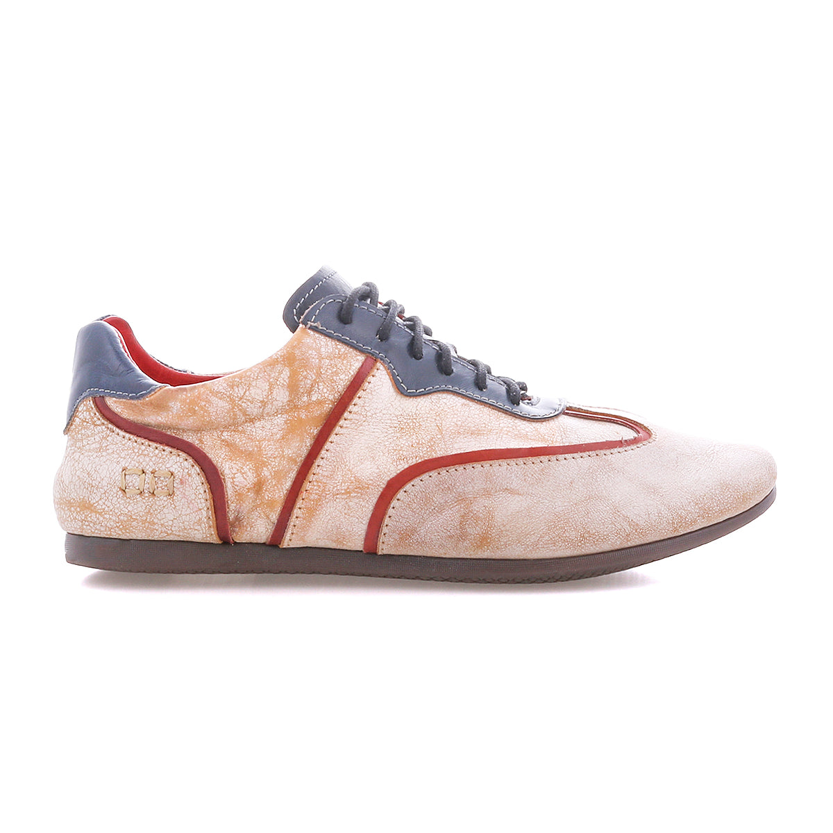 The Bed|Stü Scurry II is a beige and orange sneaker with gray laces and detailing, showcasing a lace-up design and low-profile silhouette, displayed in side profile against a white background.