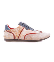 The Bed|Stü Scurry II is a beige and orange sneaker with gray laces and detailing, showcasing a lace-up design and low-profile silhouette, displayed in side profile against a white background.