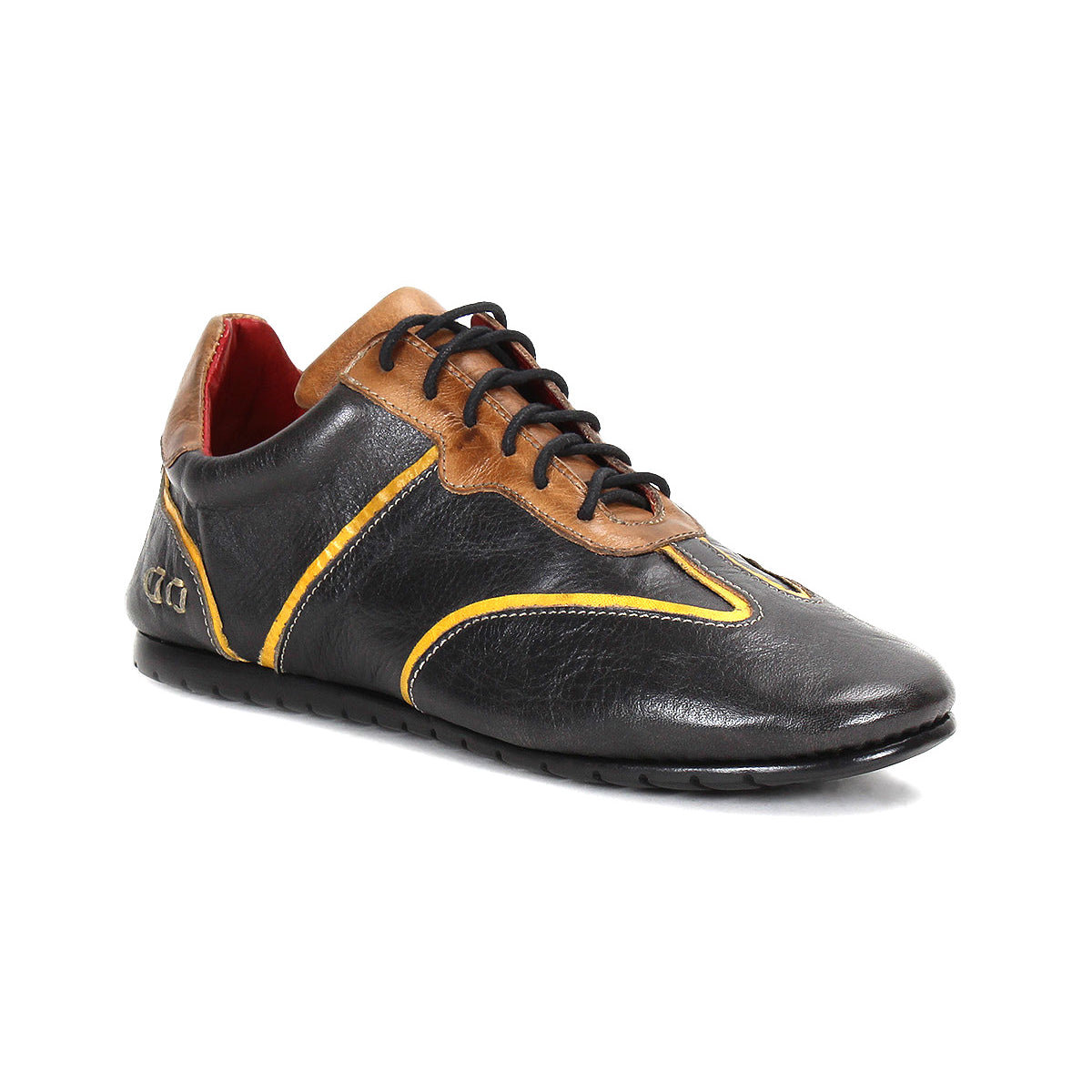 Introducing the Scurry by Bed|Stü: a retro-inspired sneaker crafted from black and brown vegetable-tanned leather with yellow accents, featuring black laces, a thin black sole, and a low-cut design built for everyday durability. Shown here photographed on a white background.