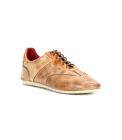 The Bed|Stü Scurry is a brown leather casual shoe, crafted from vegetable-tanned leather with dark brown laces, a low heel, and a textured design for everyday durability, displayed on a white background.