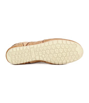The Scurry by Bed|Stü is a beige, retro-inspired sneaker shown from the bottom, featuring a light-colored sole with a honeycomb pattern and visible stitching around the edge for everyday durability.