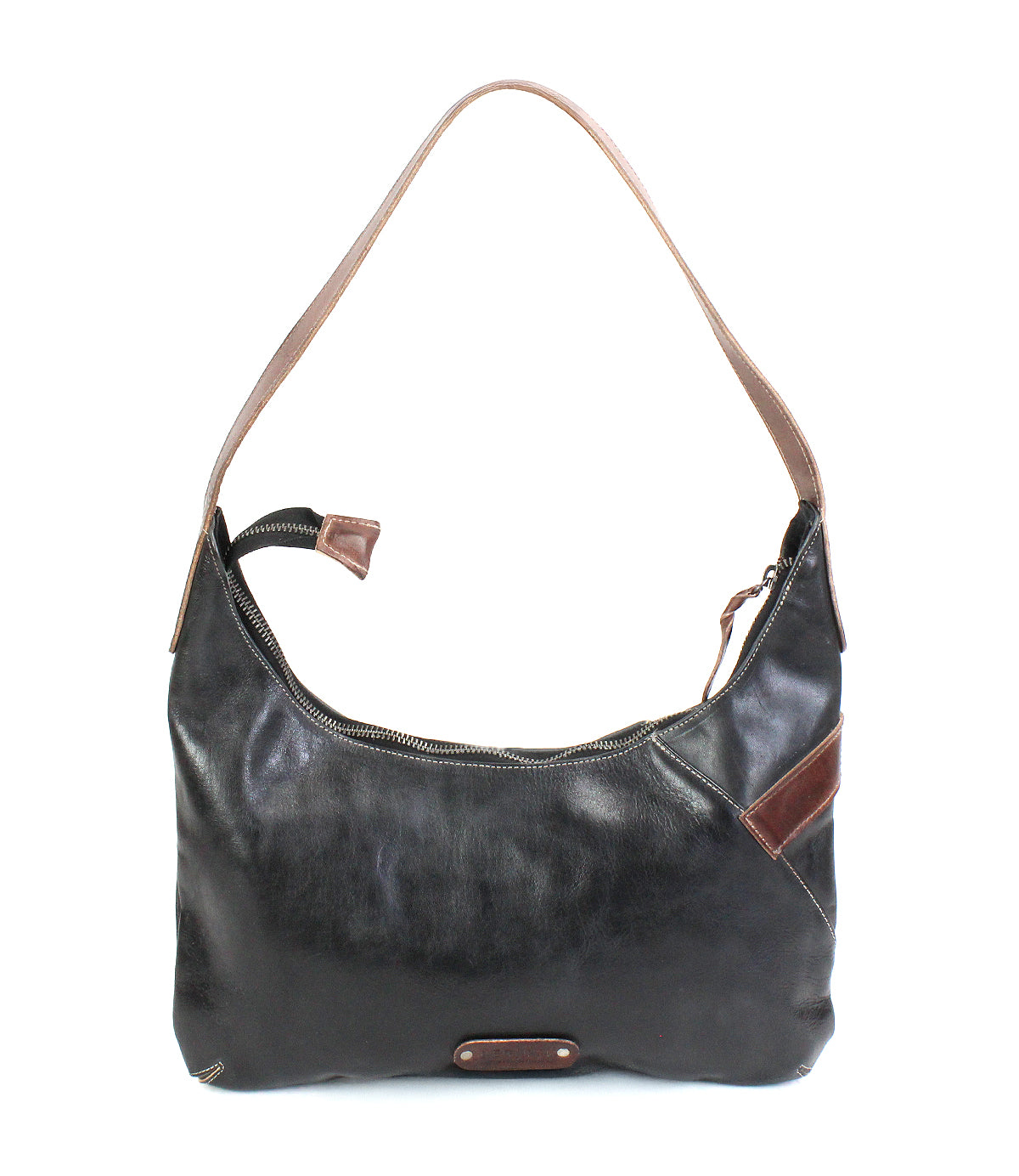 The Seemly shoulder bag by Bed|Stü features a black leather exterior with a brown strap, a zippered top opening, and a stylish brown accent detail on one side. Designed in a compact silhouette that's perfect for everyday styling, this bag is photographed against a white background.