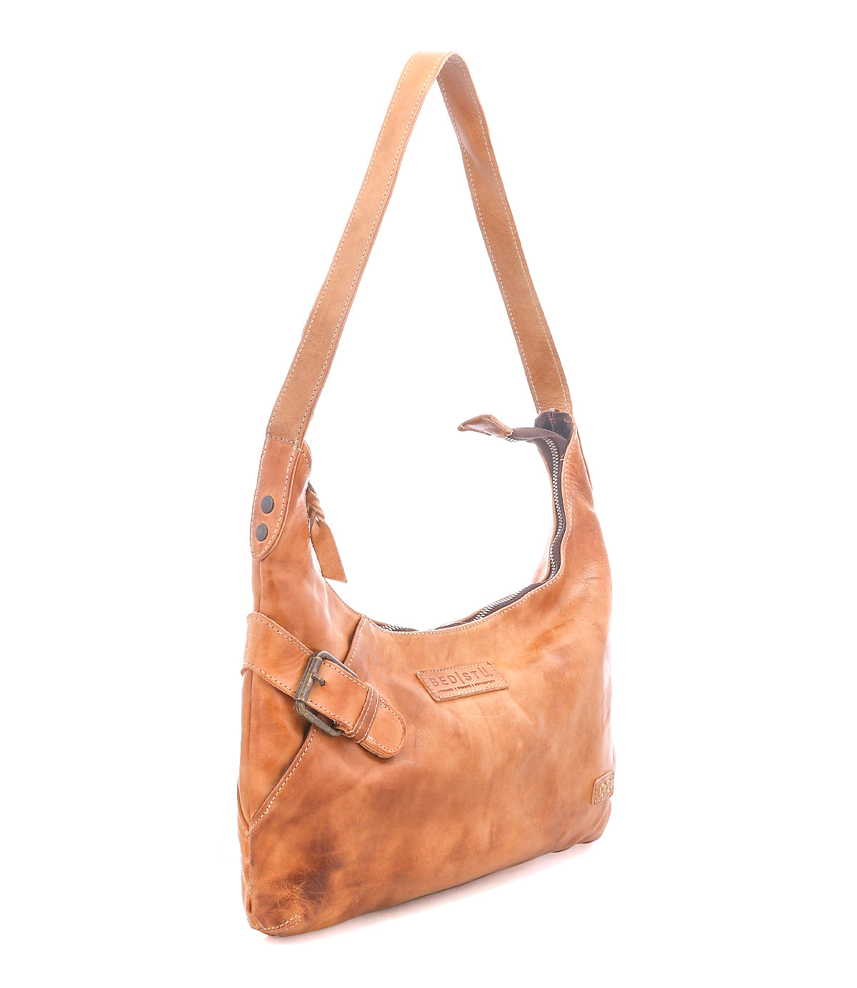 The Seemly shoulder bag by Bed|Stü features tan leather, a single strap, a stylish buckle detail, and a partially open top zipper—perfect for compact bag lovers and everyday style.