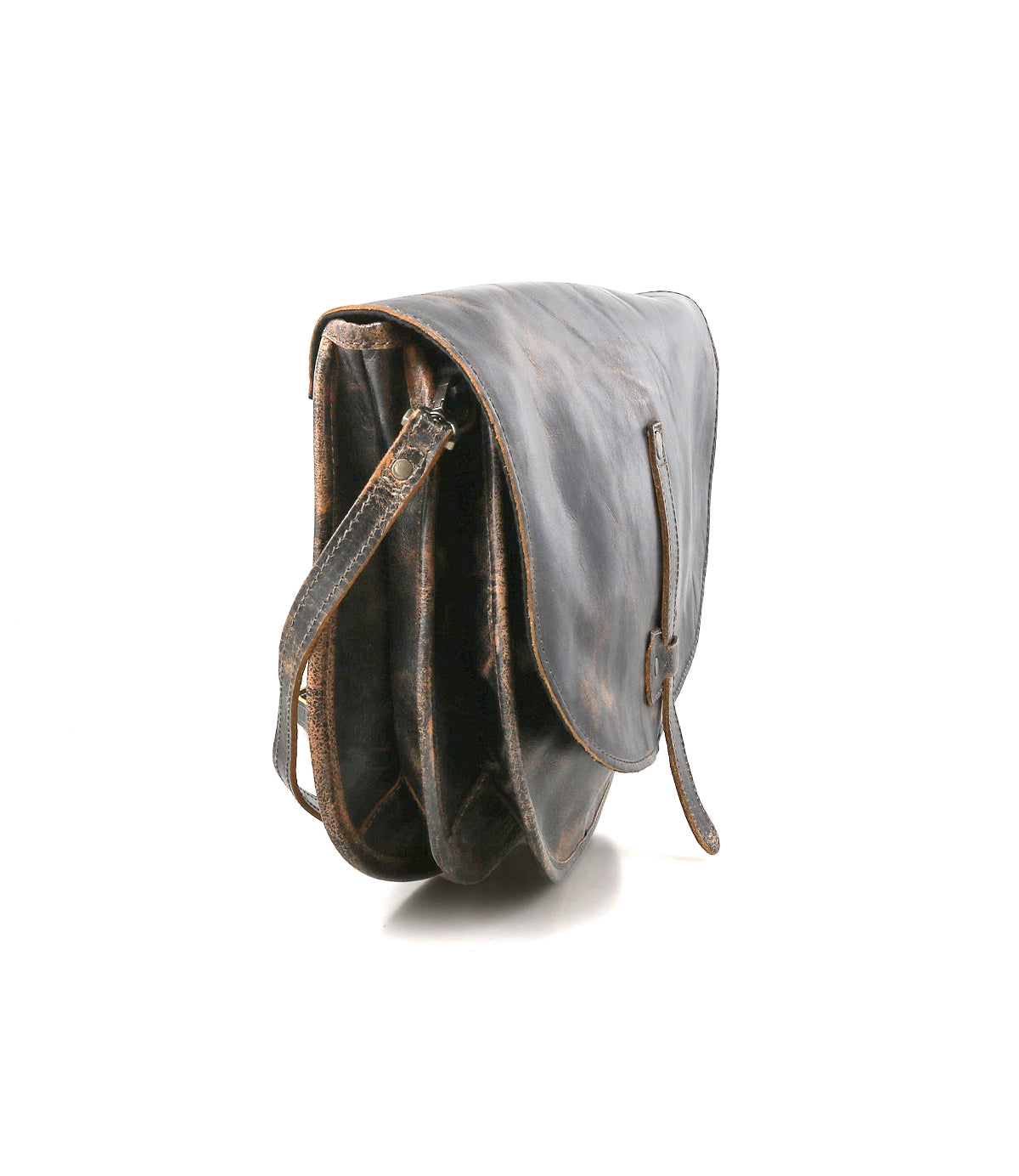 Side view of the Bed|Stü Sequoia, a worn brown satchel crafted from vegetable-tanned leather featuring a flap closure, visible crossbody strap, and multiple compartments, photographed on a white background.