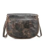 The Sequoia crossbody bag by Bed|Stü, crafted from weathered brown vegetable-tanned leather, features a flap closure and an adjustable strap, and is displayed against a white background.