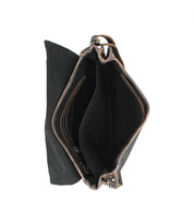 Top view of the open, empty Sequoia wallet by Bed|Stü in black vegetable-tanned leather, featuring visible compartments and a sleek tab closure, set against a white background.