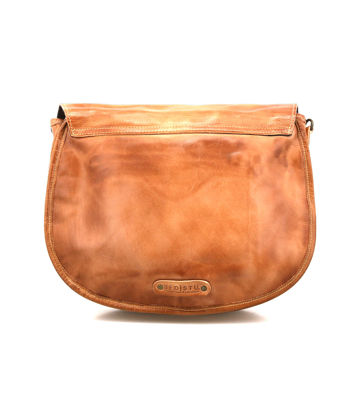 Sequoia is a light brown shoulder bag by Bed|Stü, expertly crafted from premium vegetable-tanned leather. It features a flap closure with rounded edges, and the brand name "Bed|Stü" is embossed on a small metal plate at the bottom front center of the bag for an elegant finishing touch.