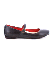 The Shuffle III by Bed|Stü is a black Mary Jane ballet flat crafted from supple leather, featuring a side buckle strap and a red interior, displayed on a white background.