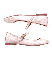 Two scuffed, metallic gold Shuffle III Mary Jane ballet flats by Bed|Stü, featuring supple leather construction, buckled straps, and red soles, are shown in profile—one above the other—against a white background.