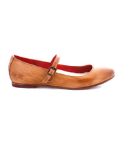 The Bed|Stü Shuffle III is a brown leather Mary Jane ballet flat featuring a buckle strap, red inner lining, and a low heel, displayed in profile against a white background.
