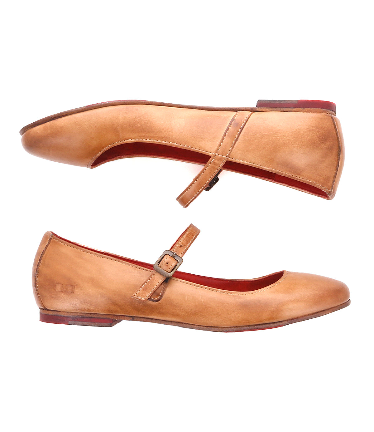 Two tan "Shuffle III" Mary Jane ballet flats by Bed|Stü, featuring a thin strap with a small buckle and crafted from supple leather, are shown from the side against a white background.
