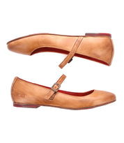 Two tan "Shuffle III" Mary Jane ballet flats by Bed|Stü, featuring a thin strap with a small buckle and crafted from supple leather, are shown from the side against a white background.