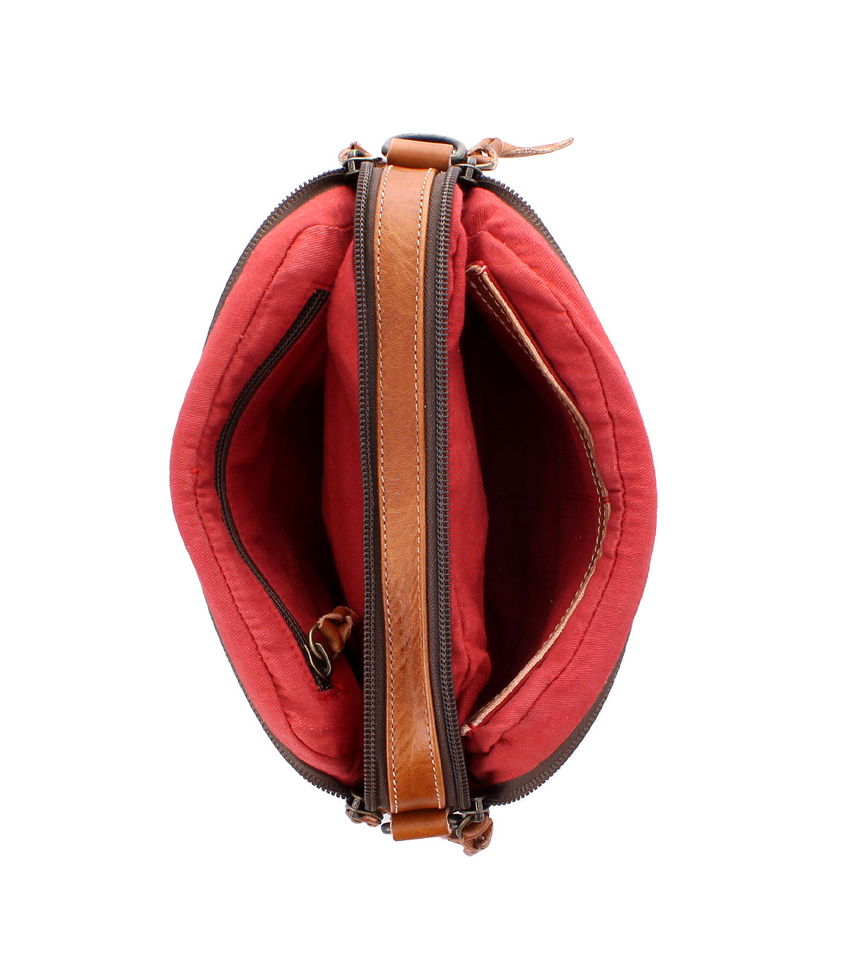 Top view of the Bed|Stü Shy—a compact leather bag featuring a red fabric interior, dual pockets, and a central zippered pocket for organized storage.