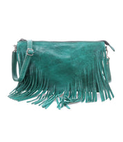 Bed|Stü’s Silverrock teal leather shoulder bag features long fringe detailing, an adjustable strap, and a zip closure. Displayed against a white background, this stylish small crossbody bag adds flair to any outfit.