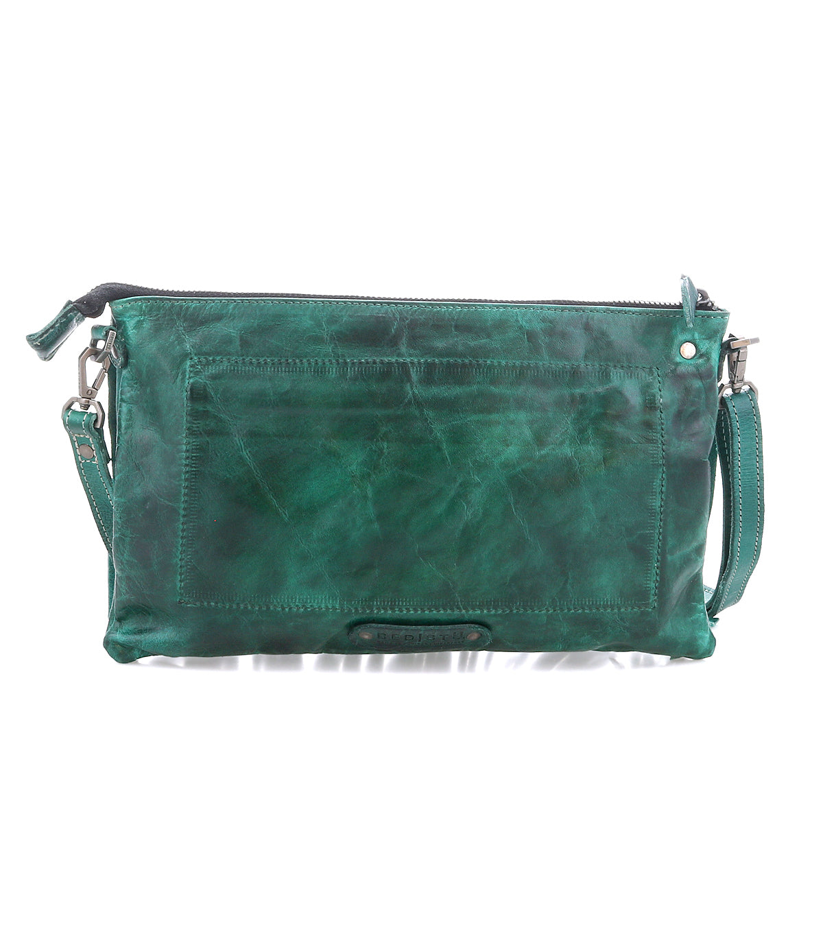 A green leather clutch bag featuring a rectangular front pocket, zipper closure, and detachable strap, the Bed|Stü Silverrock small crossbody bag is displayed against a white background.