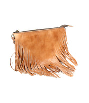 Bed|Stü Silverrock tan leather fringe flap bag featuring decorative fringe and a zipper closure, shown against a white background.