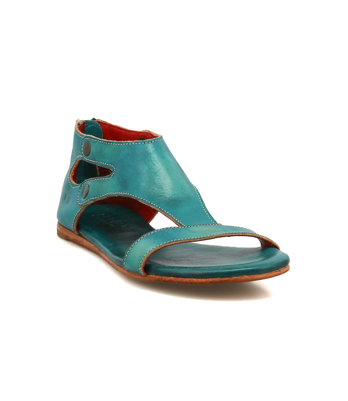 The Soto sandal by Bed|Stü features a turquoise cutout leather design with an open toe, ankle-high profile, cushioned footbed for comfort, and cutout sides—ideal for everyday adventures—shown against a white background.