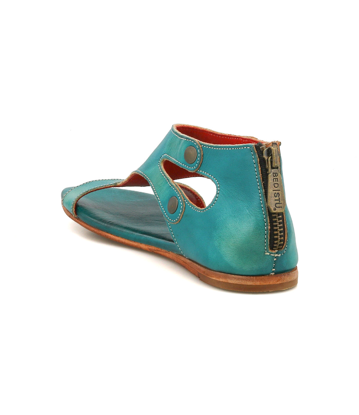 Introducing the Bed|Stü Soto—a turquoise leather sandal featuring side cutouts, prominent stitching, a back zipper closure, a low heel, and a cushioned footbed for all-day comfort—ideal for everyday adventures.