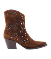The Sposa bootie by Bed|Stü features rich brown suede in a pointed toe silhouette, mid-height heel, and standout Italian craftsmanship. Decorative stitching and silver studs swirl elegantly along the side, bringing refined detailing to this artisanal ankle boot.
