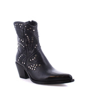 The Bed|Stü Sposa is a black western-style Italian ankle boot, crafted from vegetable-tanned leather with silver studs, a pointed toe bootie silhouette, and a chunky angled heel, shown on a white background.