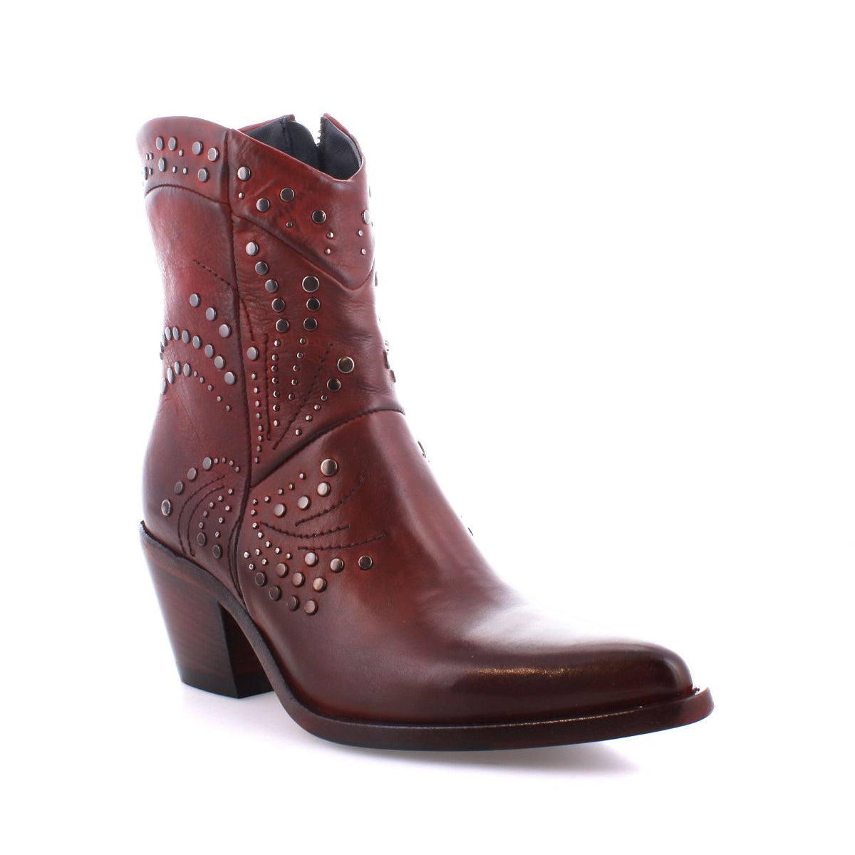 Showcased against a white background, the Sposa by Bed|Stü is an Italian ankle boot crafted from vegetable-tanned brown leather, featuring a pointed toe, patterned stitching, metal stud accents, and a chunky heel for enduring quality and style.