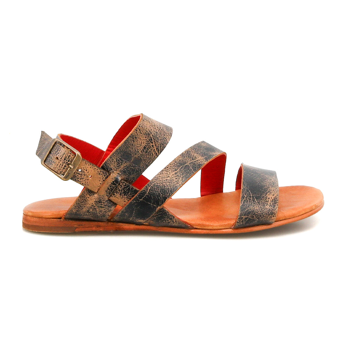 The Bed|Stü Superb is a brown leather sandal with three straps and a buckle, featuring a flat sole with a slight heel. Shown in side profile on a white background, this sandal is designed for everyday wear and includes an adjustable ankle strap for a secure and comfortable fit.