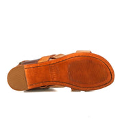 Bottom view of the Bed|Stü Superb sandal in brown leather, showcasing a textured rubber sole with visible edge stitching and an adjustable ankle strap—designed for secure, comfortable everyday wear.