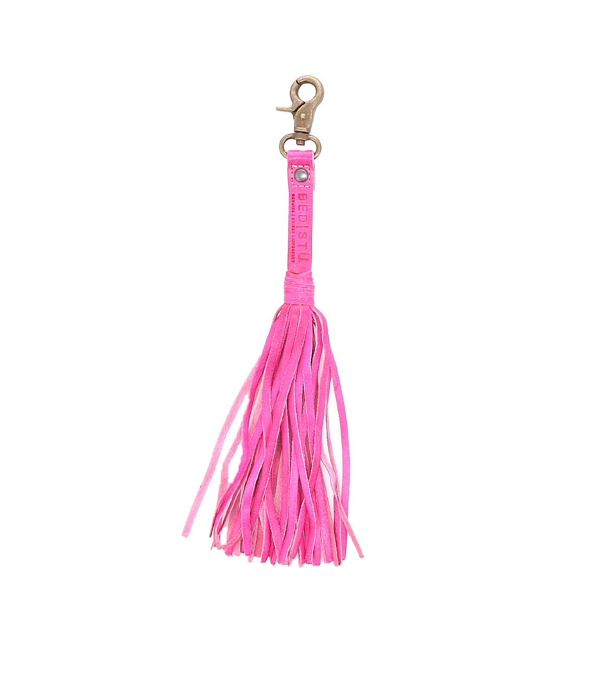 A pink leather tassel clip with a gold clasp and "Bed|Stü" branding on the strap, this stylish Tassel Clip doubles as a chic bag accessory or keychain charm.