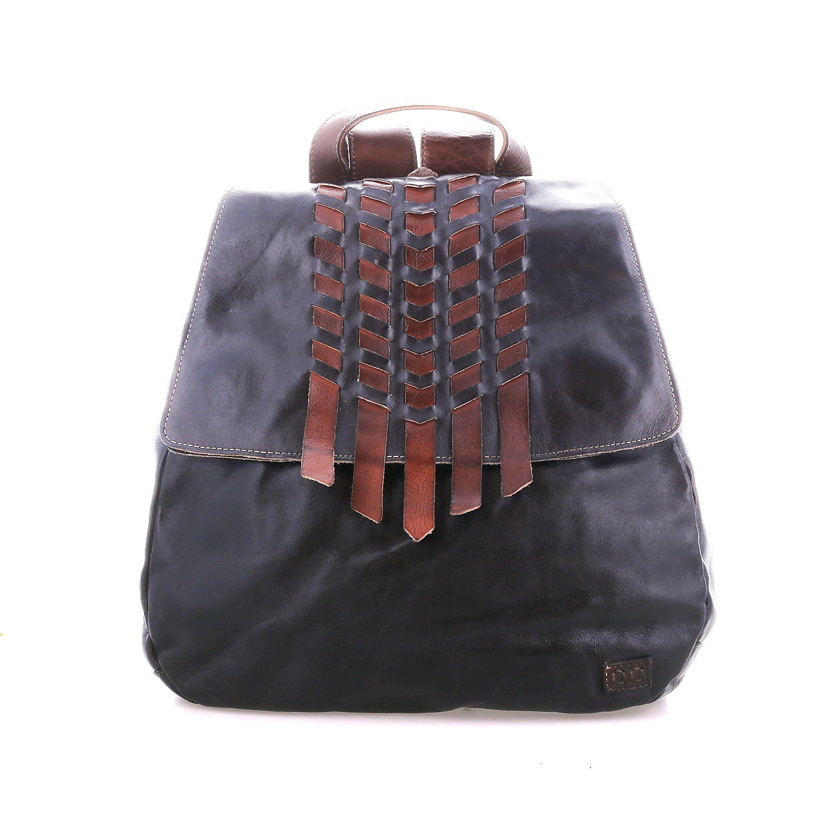 The Teji backpack by Bed|Stü is crafted from black leather with a flap cover, featuring decorative handwoven brown leather accents on the front and a small logo patch in the lower corner, blending artisanal charm with timeless style.