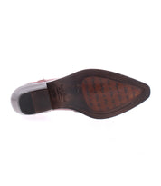 The image shows the sole of the Tentativa by Bed|Stü, a pointed dress shoe featuring a low, stacked heel in dark brown, with visible Bed|Stü brand markings on the arch and ball of the foot area.