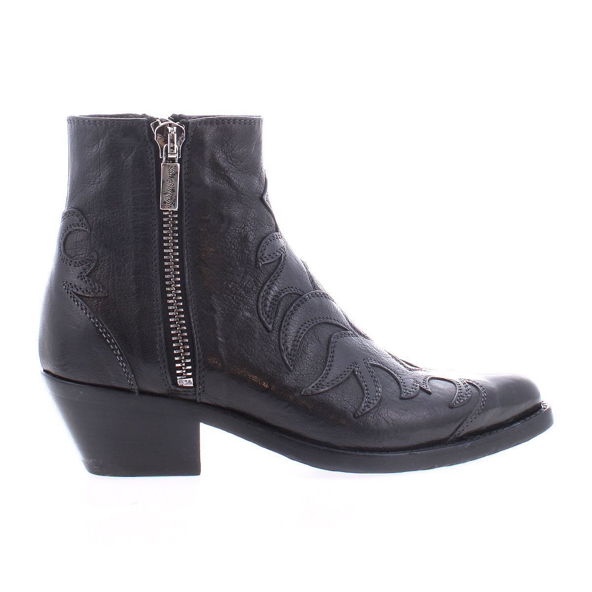 The Tentativa boot by Bed|Stü is a handcrafted Italian black leather ankle boot featuring a side zipper, decorative upper stitching, and a low angled stacked heel; shown in profile on a white background, it exudes sophisticated style with subtle vintage Western influences.